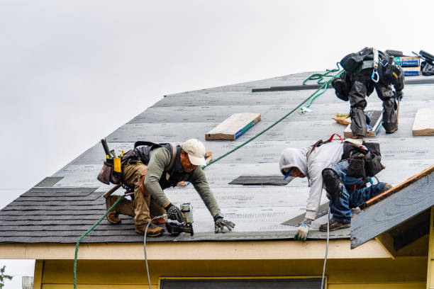 Professional Gutter Installation technician working in Laurel, NY